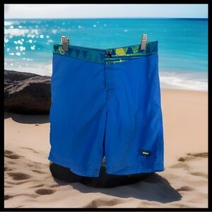 Vintage one button Quiksilver board shorts.